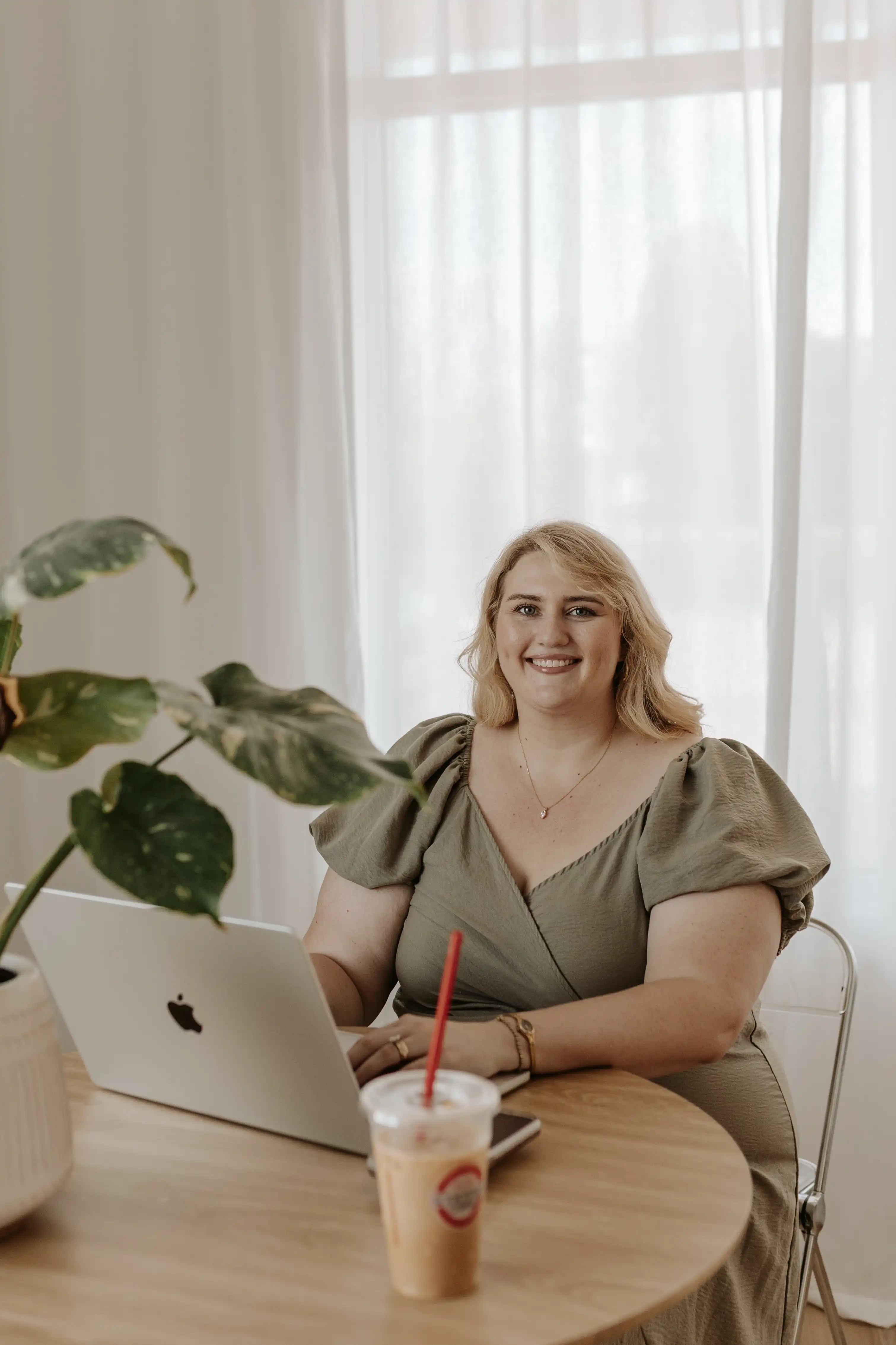 Lexis Jindra working on website design for small businesses